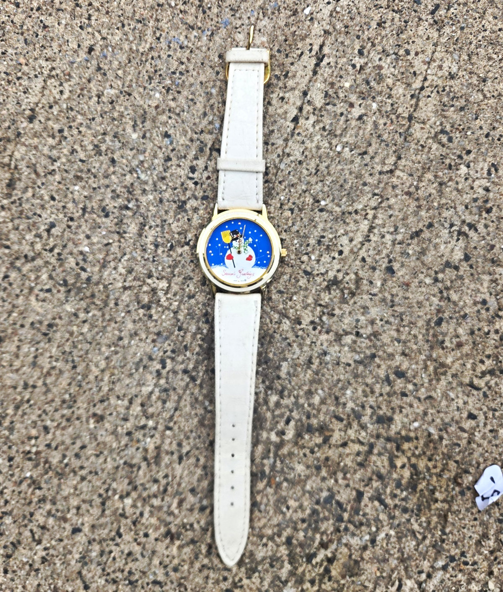 Seasons Greetings Women’s Quartz Analog Snowman Dial White Leather Gold Case